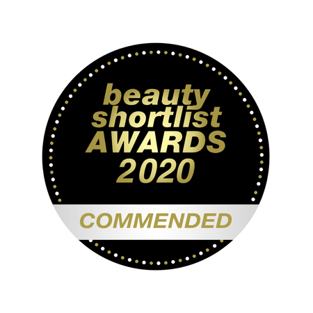 round black badge with gold text beauty shortlist awards 2020 and white banner reading commended calm your skin unwind your mind