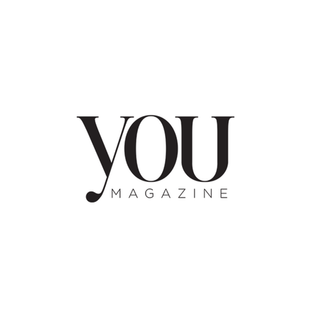black serif text logo displaying You Magazine with calm your skin unwind your mind tagline