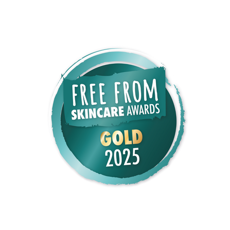 teal circular award badge with distressed edges reading Free From Skincare Awards Gold 2025 calm your skin unwind your mind